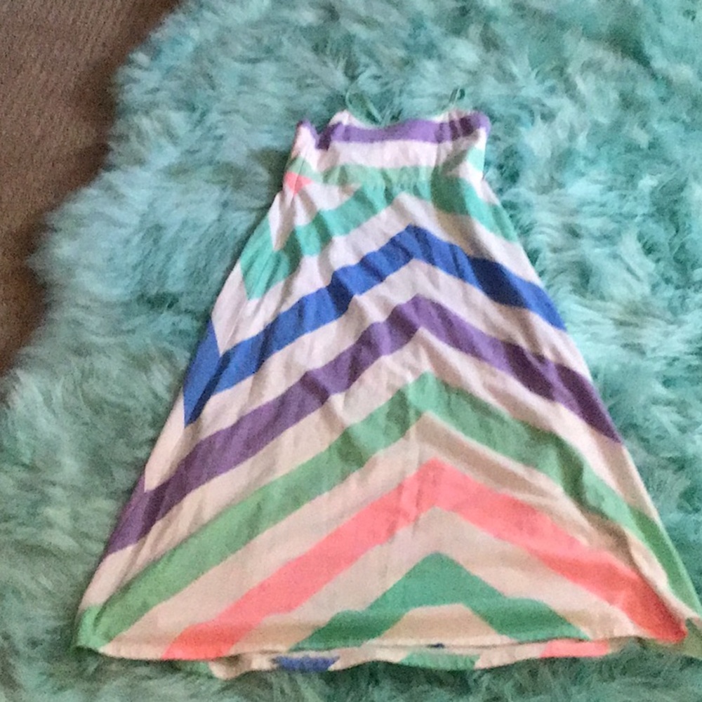 White, mint green, peach, blue, and purple dress